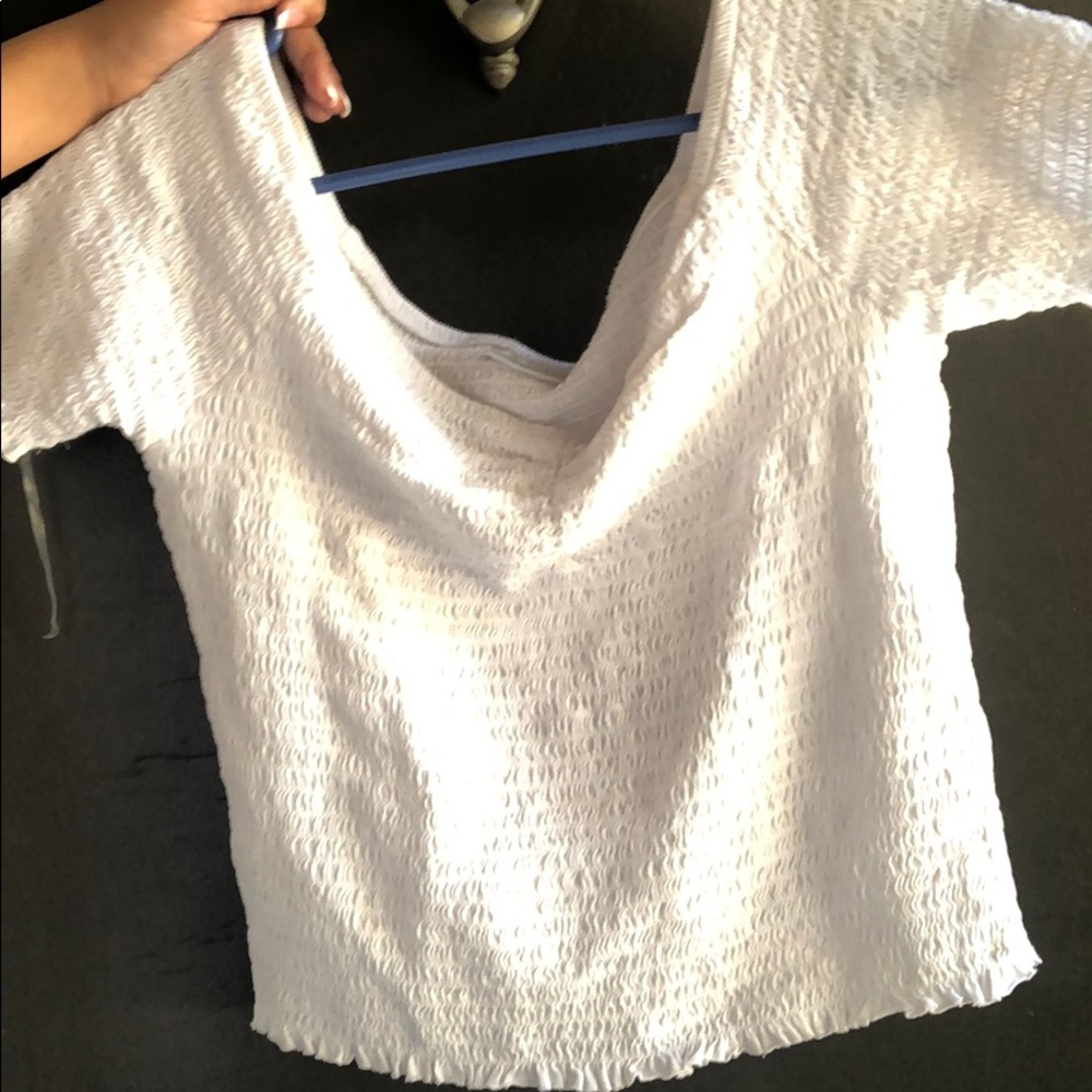 White ruffles top